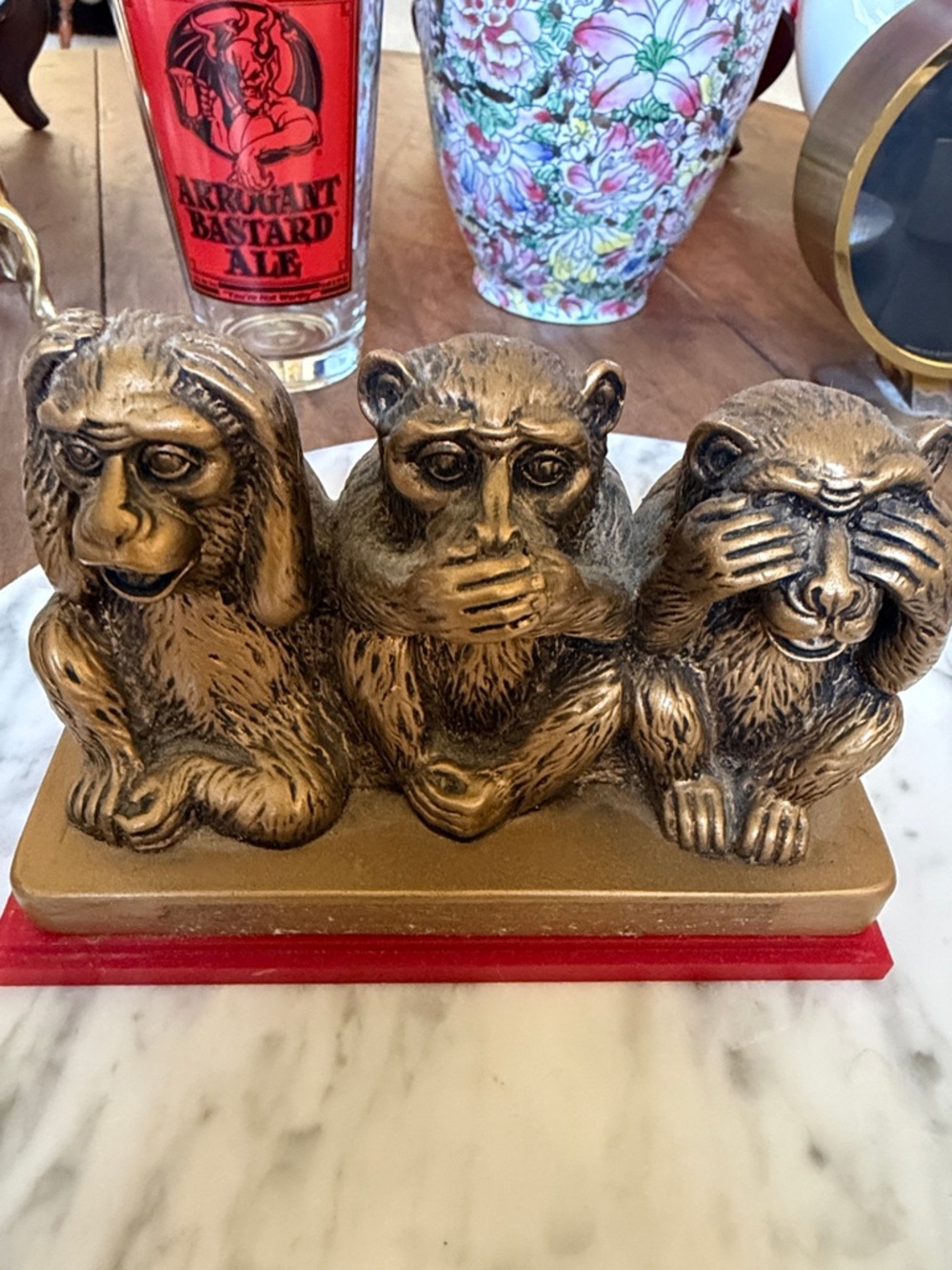 Three Wise Monkeys Statue - gold finish  with Red Base